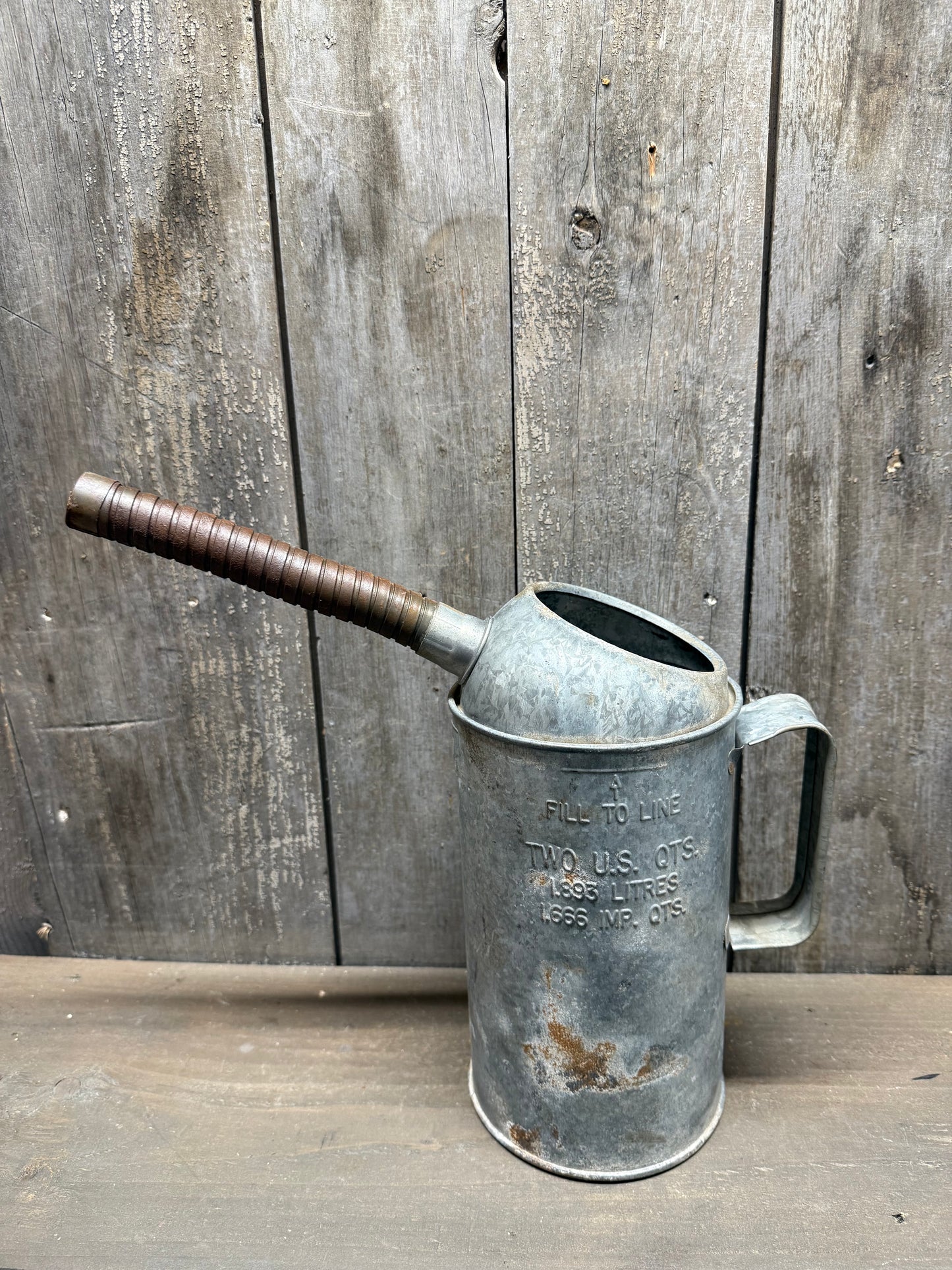 OLD CAN W/SPOUT, Two U.S QTS.
