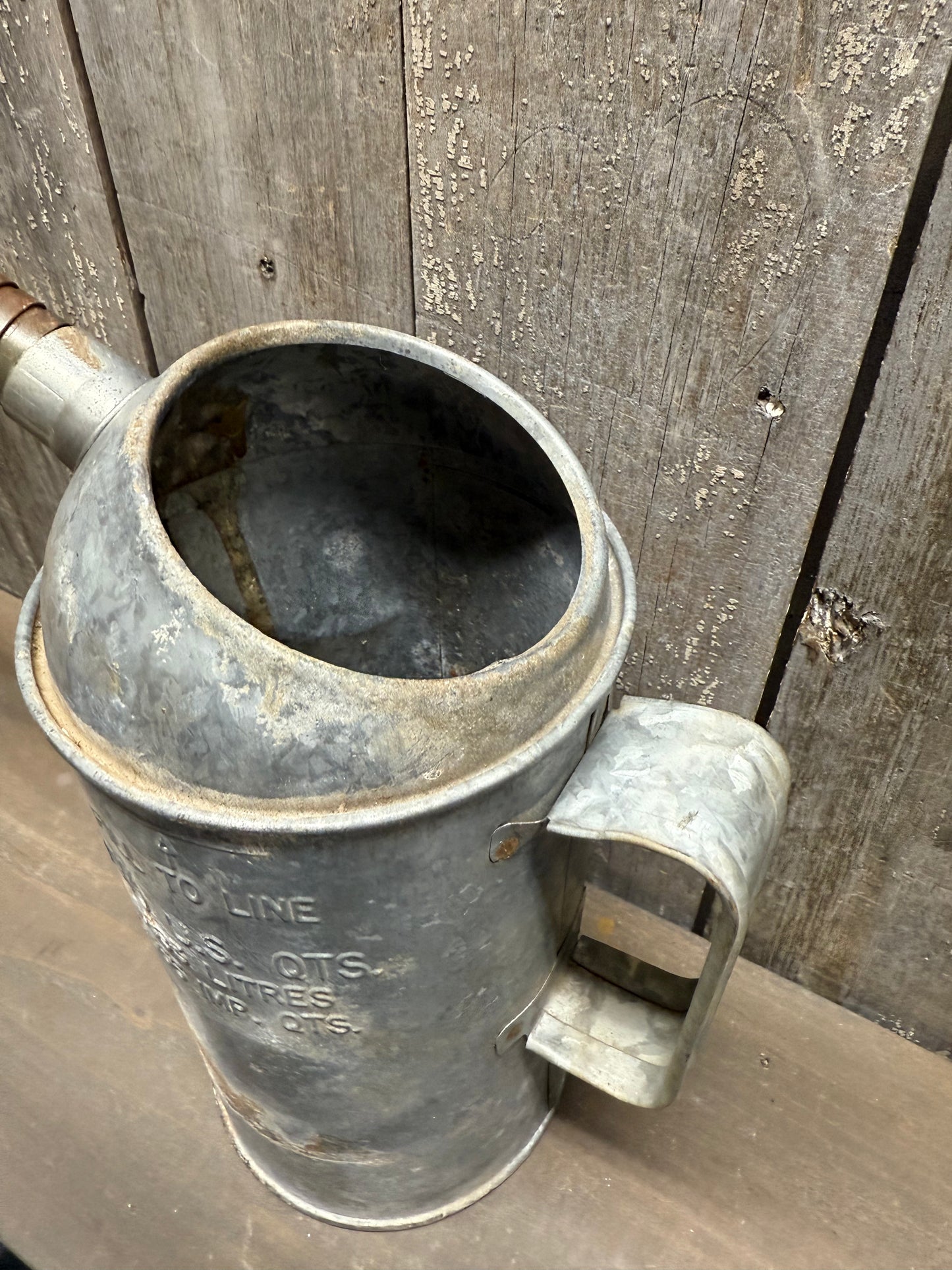 OLD CAN W/SPOUT, Two U.S QTS.
